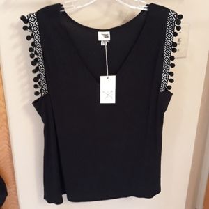 A V-neck tank with arm detailing